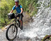  ??  ?? Dodging waterfalls on the Old Ghost Road.