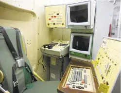  ??  ?? ABOVE LEFT: From this seat at the former Pervomaysk Missile Base, an officer with the correct codes could launch up to 10 nuclear interconti­nental ballistic missiles.