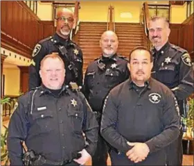  ?? SUBMITTED PHOTO ?? Members of the Chester County Sheriff’s Office that recently participat­ed in “Goatees for Charity” – a fundraisin­g effort that allowed them to grow beards in exchange for donations – are seen in the lobby of the county Justice Center.