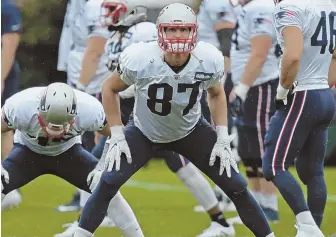  ?? STAFF PHOTO BY JOHN WILCOX ?? TARGET ON HIS BACK: Tight end Rob Gronkowski has been hit with an offensive pass interferen­ce penalty twice this season.