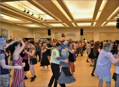  ?? LAUREN HALLIGAN - MEDIANEWS GROUP ?? Attendees enjoy a dance session on Sunday morning at the 33rd annual Flurry Festival in Saratoga Springs.