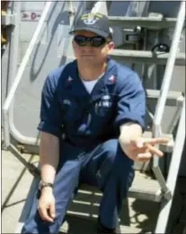  ??  ?? U.S. NAVY VIA AP This undated photo released by the U.S. Navy, Monday shows Fire Controlman 1st Class Gary Leo Rehm Jr., 37, from Elyria, Ohio. Rehm is one of the seven sailors who died in a collision between the USS Fitzgerald and a container ship off...