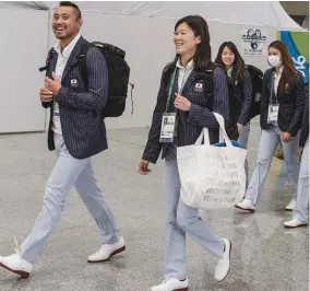  ?? AFP ?? Comitiva japonesa desembarca nas terras do samba com optimismo estampado nos rostos