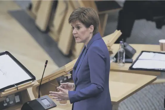  ??  ?? 2 First Minister Nicola Sturgeon, at Holyrood yesterday, as she announced that golf, along with tennis, bowls and angling, would be allowed in the first stage of the lifting of lockdown.