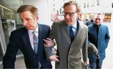  ??  ?? Under probe: Nix arriving at the offices of Cambridge Analytica in central London. — Reuters