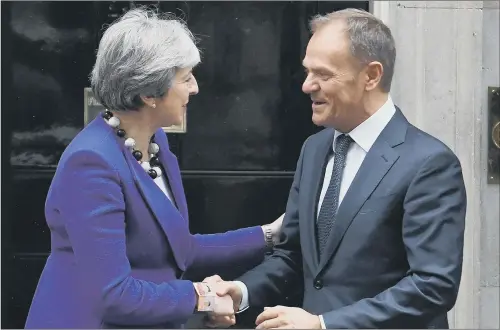  ?? PICTURE: VICTORIA JONES/PA WIRE. ?? MEETING: Prime Minister Theresa May greets European Council president Donald Tusk before talks at 10 Downing Street.