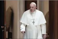  ?? AP PHOTO/ANDREW MEDICHINI ?? Pope Francis arrives for his weekly general audience in the Pope Paul VI hall at the Vatican, Wednesday, Jan. 4, 2023.