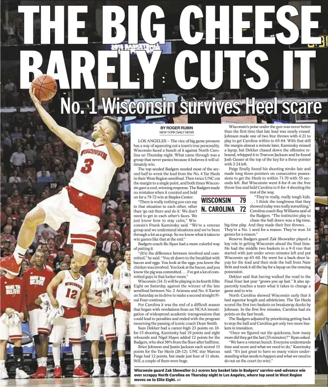  ?? AP ?? Wisconsin guard Zak Showalter (r.) scores key basket late in Badgers’ survive-and-advance win over scrappy North Carolina on Thursday night in Los Angeles, where top seed in West Region moves on to Elite Eight.