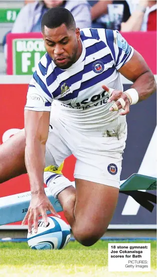  ?? PICTURES: Getty Images ?? 18 stone gymnast: Joe Cokanaisga scores for Bath