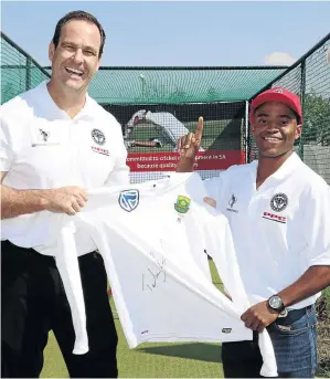  ?? / SUPPLIED ?? Cement company PPC has backed Temba Bavuma in his initiative to develop young black cricketers. Bavuma is seen here with Rob Rein of PPC in Soweto last month.