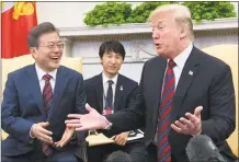  ?? Saul Loeb / AFP/Getty Images ?? President Donald Trump and South Korean President Moon Jae-in meet on May 22 in the Oval Office of the White House.