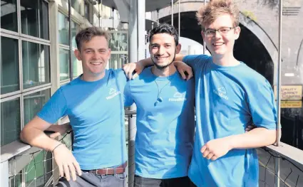  ??  ?? &gt; Hausbot’s co-founders Jack Cornes and Harry Smith with technician Mahmoud Ibrahim (centre)