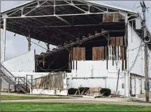  ?? JAROD THRUSH / STAFF ?? The Montgomery County Fairground­s historic grandstand was damaged during Wednesday night’s storms.