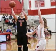  ?? PAUL DICICCO — FOR THE NEWS-HERALD ?? Cornerston­e Christian’s Madison Cloonan shoots against Mentor on Jan. 7. Cloonan and the Patriots will play Andrews Osborne on March 2 in a Division IV district final at Grand Valley.