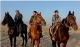  ?? — AFP ?? Afghan men ride horses in Mazar- i- Sharif.