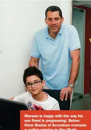  ??  ?? Marwan is happy with the way his son Remi is progressin­g. Below: Omar Boulos of Accenture oversees a coding session in Abu Dhabi