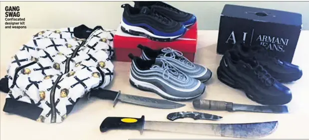  ??  ?? GANG SWAG Confiscate­d designer kit and weapons