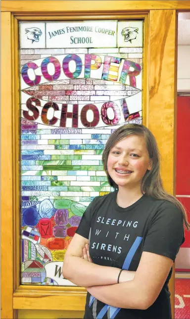  ?? MICHAEL SEARS / MSEARS@JOURNALSEN­TINEL.COM ?? Brianna Guzman, 14, poses at James Fenimore Cooper School in Milwaukee. Gunzman is an eighth-grade student there.