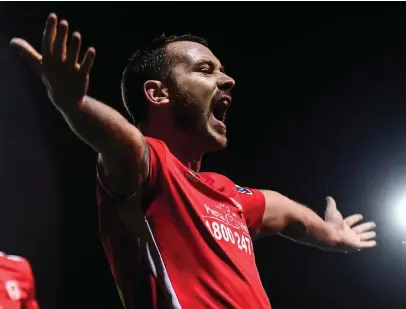  ?? STEPHEN McCARTHY/SPORTSFILE ?? Kurtis Byrne celebrates after scoring St Patrick’s Athletic’s fourth goal at Richmond Park