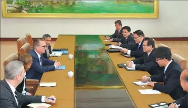  ?? KOREAN CENTRAL NEWS AGENCY VIA REUTERS ?? Pak Myong-guk, DPRK’s vice-foreign minister, talks with UN Undersecre­tary-General Jeffrey Feltman in Pyongyang on Dec 6.