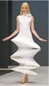  ?? PAVEL GOLOVKIN/AP FILE PHOTO ?? A model displays a creation by French fashion designer Pierre Cardin in 2016 in Russia.