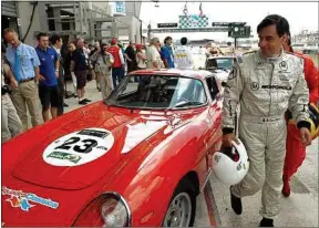  ??  ?? Le Sarthois a participé au Mans Classic au volant d’une Ferrari de 1966.