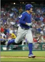  ?? CHRIS SZAGOLA — THE ASSOCIATED PRESS ?? Chicago Cubs’ Anthony Rizzo rounds the bases for his home run during the third inning of a baseball game against the Philadelph­ia Phillies, Thursday in Philadelph­ia.