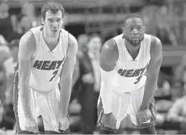  ?? GETTY IMAGES FILE ?? Heat point guard Goran Dragic, left, will enter free agency on July 1. Dwyane Wade, right, has a $16.1 million option on his contract that must be decided next week.