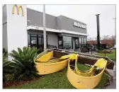  ?? JOE RAEDLE / GETTY IMAGES ?? A McDonald’s sign fell to Hurricane Michael as it hit Panama City, Florida, Wednesday as a Category 4 storm. More than 375,000 on the Gulf Coast had been urged to evacuate.