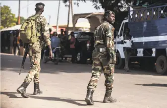  ?? Sylvain Cherkaoui / Associated Press ?? Soldiers patrol in Karang, Senegal, along the nation’s border with Gambia. They are part of a regional security force that also includes troops from Ghana, Nigeria, Togo and Mali.