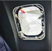  ?? MARTY MARTINEZ VIA AP ?? This window shattered after the engine of a Southwest Airlines jet blew out, resulting in the death of a passenger who was nearly sucked out of the plane.