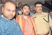  ?? PTI ?? Police arrest Arijit Shashwat, son of Union MoS Ashwini Kumar Choubey, in Patna on Sunday.