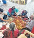  ??  ?? Inmates of NGO Kalaiselvi Karunalaya engaged in flower segregatio­n