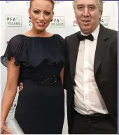  ??  ?? item: John Delaney with Emma English at the PFA Ireland awards earlier this month