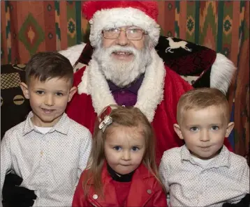  ??  ?? James, Ellie and Danny Byrne with Santa at the Christmas Fair in Clonard Community Centre on Sunday afternoon.