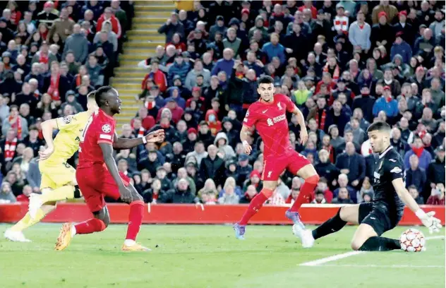  ?? Agence France-presse ?? ↑
Liverpool’s Sadio Mane (second left) scores against Villarreal during their Champions League semi-final first leg match.