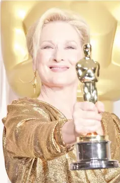  ??  ?? Streep holds her Oscar for Best Performanc­e by an Actress in a Leading Role for ‘The Iron Lady’ in the press room at the 84th Annual Academy Awards on Feb 26, 2012 in Hollywood, California. —AFP file photo