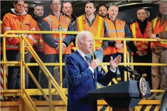  ?? John Minchillo/Associated Press ?? President Joe Biden speaks at the constructi­on site of the Hudson Tunnel Project on Tuesday in New York to showcase a $292 million mega grant that will be used to help build a rail tunnel beneath the Hudson River.