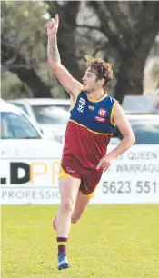  ?? Photograph­s by AMANDA EMARY. ?? Dusties player Todd Beck celebrates one of his two goals.