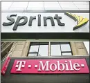  ??  ?? This file photos shows signage for a Sprint store in New York’s Herald Square, top, and signage at a T-Mobile store in New York. (AP)