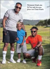  ??  ?? Mthokozisi Khathi, aka DJ Tiro, with his sons, Junior and Chase Khathi.