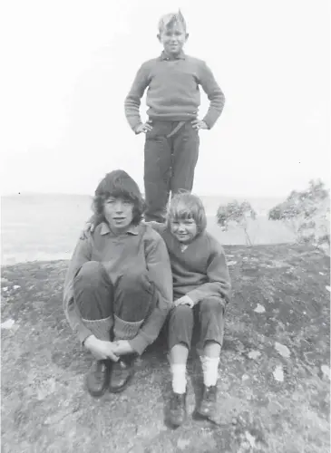  ??  ?? Bev Barrett (then Bev Clifford) at right with young friends atop Mount Cannibal that in the 1960s was included in the 200-acre property her parents farmed.