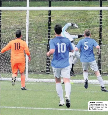  ??  ?? Gutted Doune’s Malcolm Scott sees his header tipped over by the Dalziel keeper