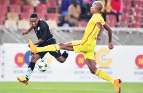  ??  ?? IN THE LINE OF FIRE . . . Zimbabwe defender Devine Lunga moves in to block a shot in the quarter-finals of the COSAFA Cup at the Peter Mokaba Stadium in Polokwane yesterday.