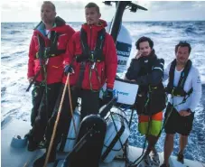  ??  ?? Exhausted crew at the stern of the VO65 Sisi. The crossing was a full-on racing exercise, and hard, intensive work