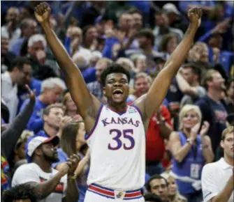  ?? AJ MAST — THE ASSOCIATED PRESS ?? Kansas’ Udoka Azubuike (35) reacts to Michigan State committing a foul late in the second half at the Champions Classic in Indianapol­is on Tuesday. Kansas won 92-87.