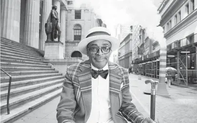  ?? DAVID LEE ?? Spike Lee on the set of his commercial for Coin Cloud, a company that makes kiosks to buy and sell cryptocurr­encies. The filmmaker’s commercial for a crypto company is one of many recent marketing efforts to make digital cash palatable for newbies.