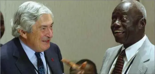  ??  ?? Ciroma cracks a joke with former World Bank President, James Wolfensohn at an event in 2002