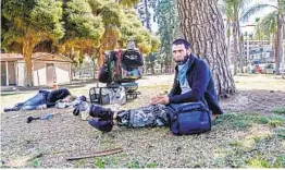  ?? EDUARDO CONTRERAS U-T ?? Thomas Aaron Mellon, who says he is homeless, hangs out for the day near Sixth Avenue in Balboa Park on Tuesday in San Diego.