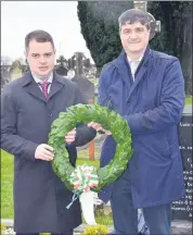  ?? (Pic: John Ahern) ?? Cllr. William O’Leary and Ciaran O’Keeffe, laying the wreath at last Sunday’s Easter Rising commemorat­ion in Kilcrumper Graveyard.